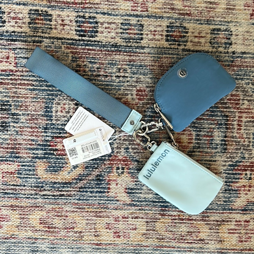 New with tags, never used dual pouch wristlet in powder blue/utility blue.